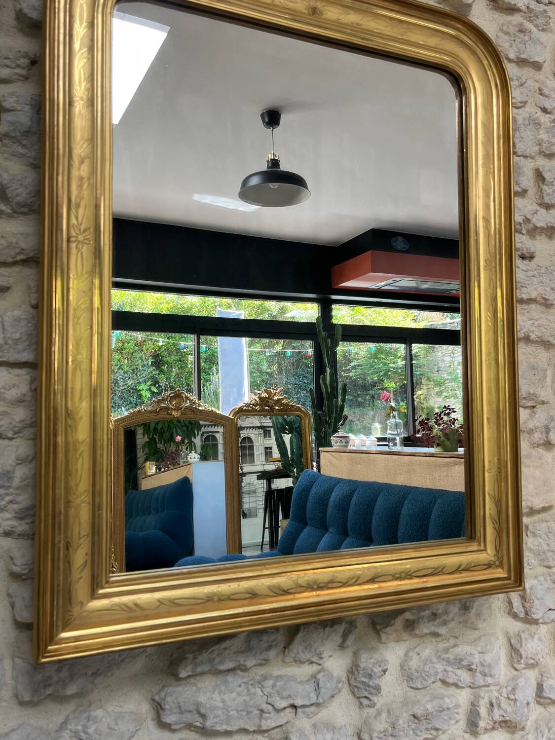 Antique mirror 86.5/69cm Louis-Philippe gilded with gold leaf, engraved decoration.