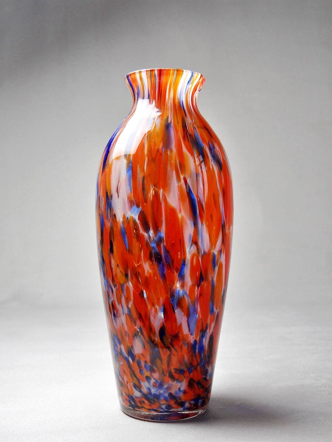 Small antique art deco cobalt orange speckled glass paste vase
