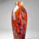 Small antique art deco cobalt orange speckled glass paste vase