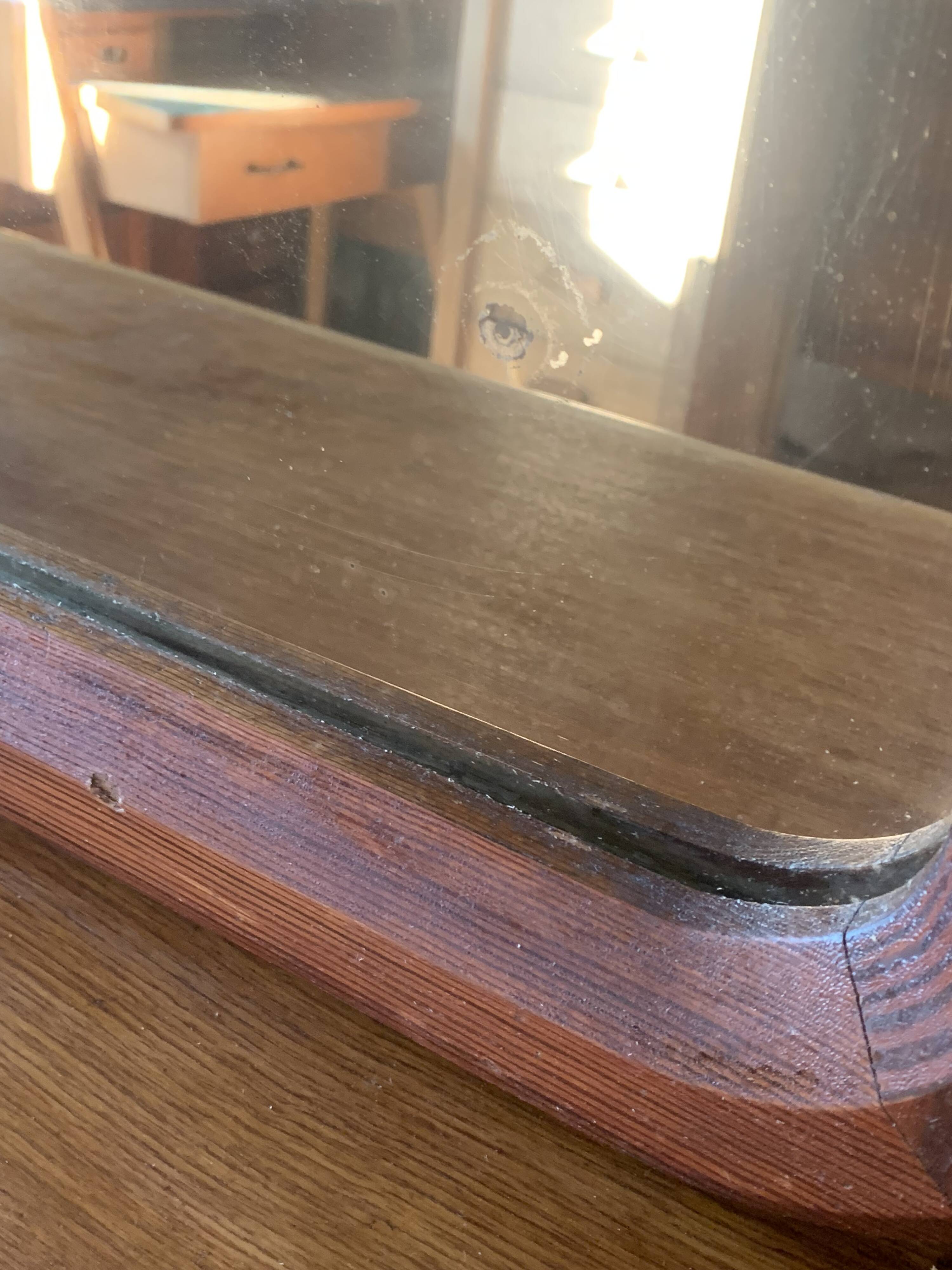 Old vintage wooden wall mirror