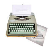 Typewriter hermes baby rocket lime green with its brown suitcase revised ribbon new