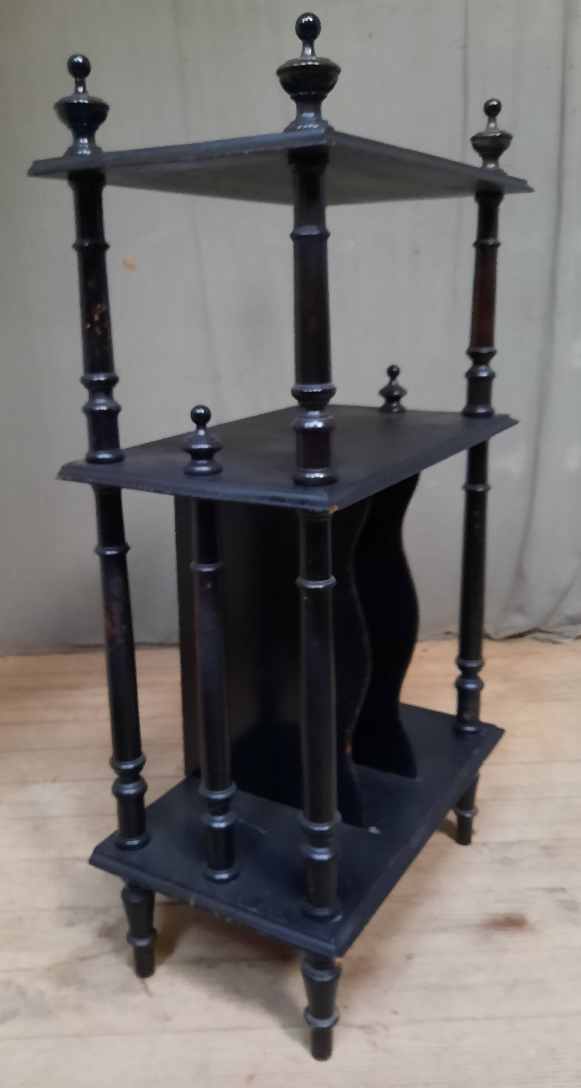 Blackened wooden shelf