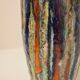 Vase en céramique émaillé multicolore signé