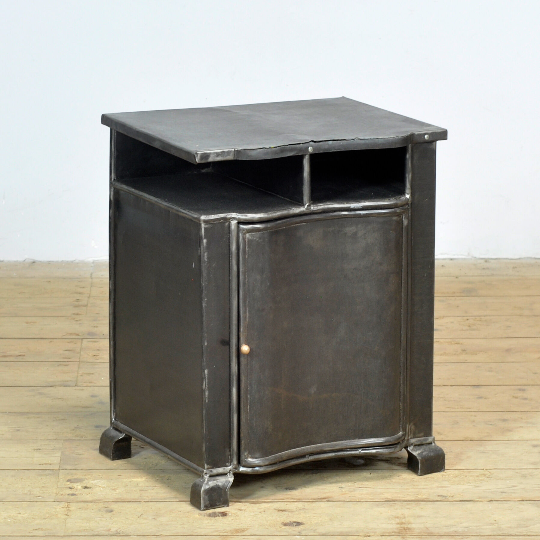 Iron bedside table, circa 1930