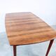 Extendable dining table in rosewood