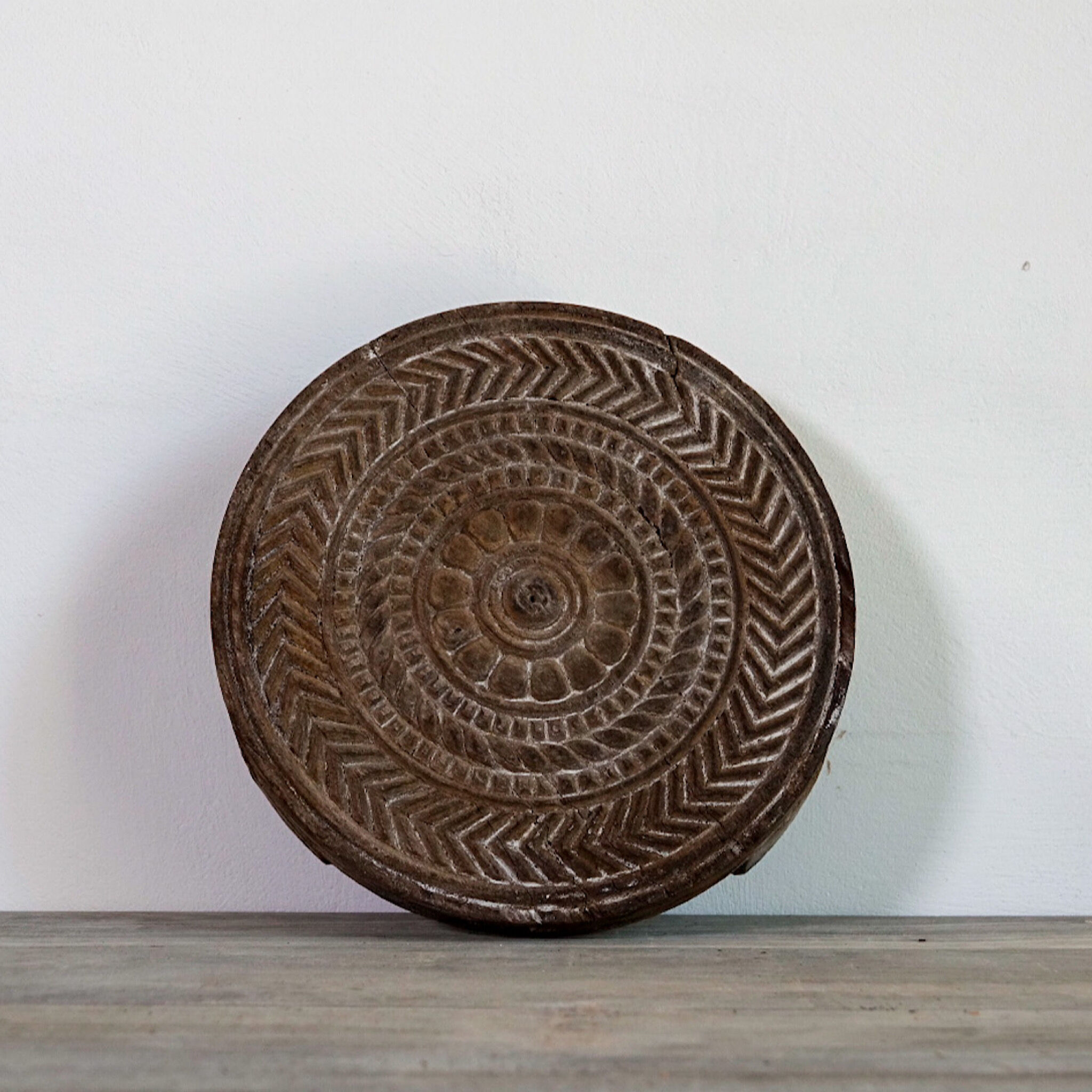 Carved wooden chapatis board