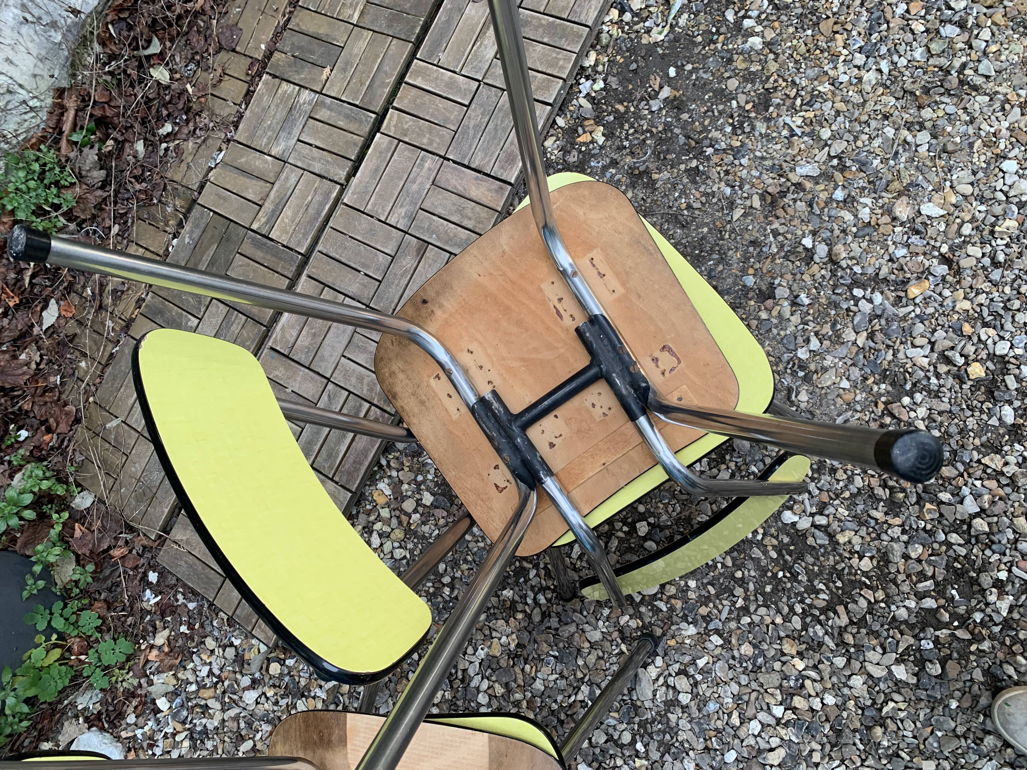 Yellow Formica chairs with compass legs, 1950s