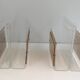 Pair of magazine racks in plexiglass, brass and inlaid caning in the style of Christian Dior and Gabriella Crespi