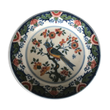 Wall plate in earthenware decorated with painting of flowers and bird 28 cm