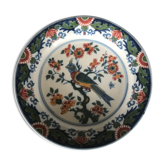 Wall plate in earthenware decorated with painting of flowers and bird 28 cm