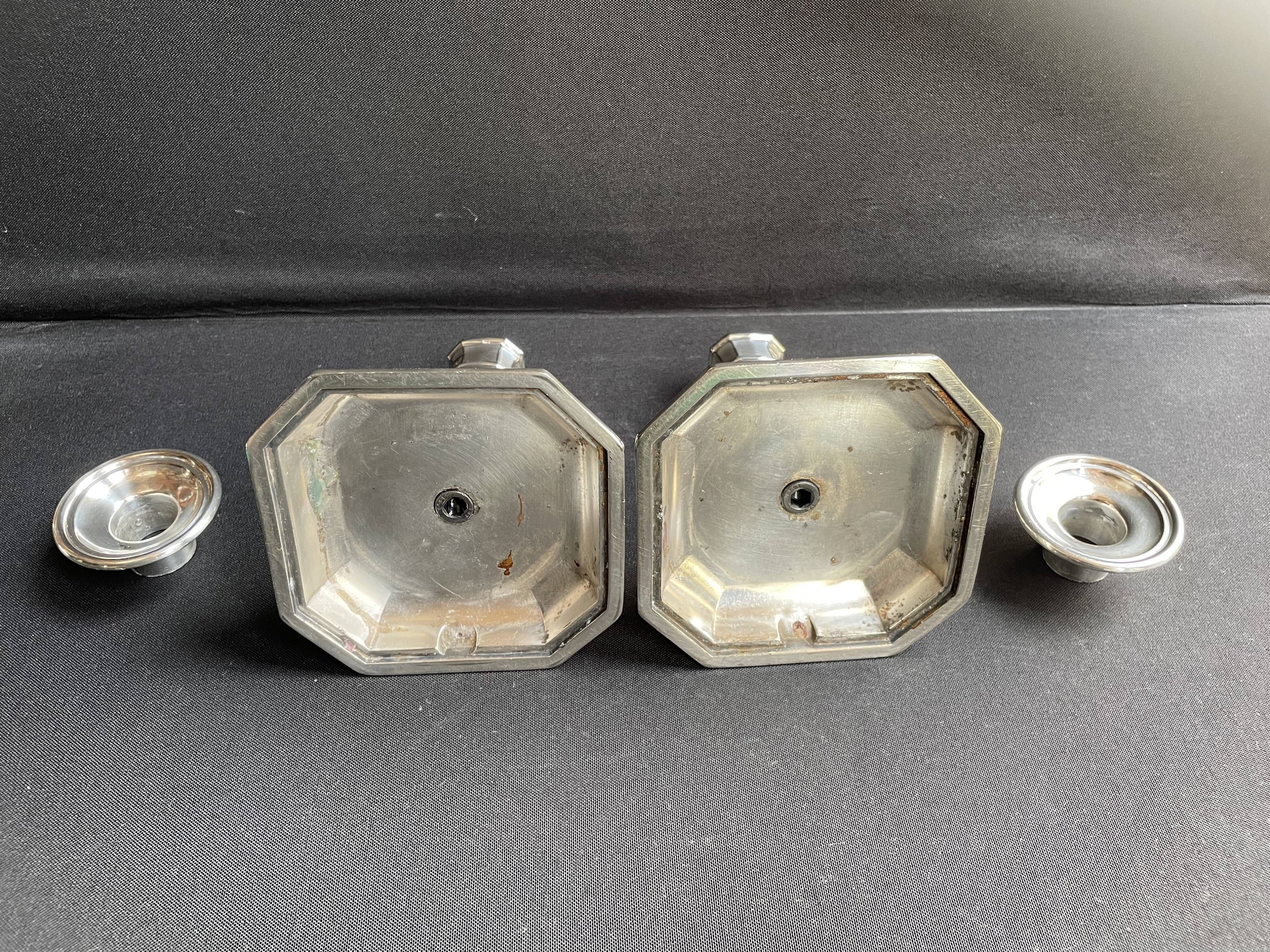 Pair of candlesticks in silver metal regency style