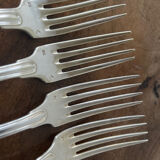 4 silver metal forks