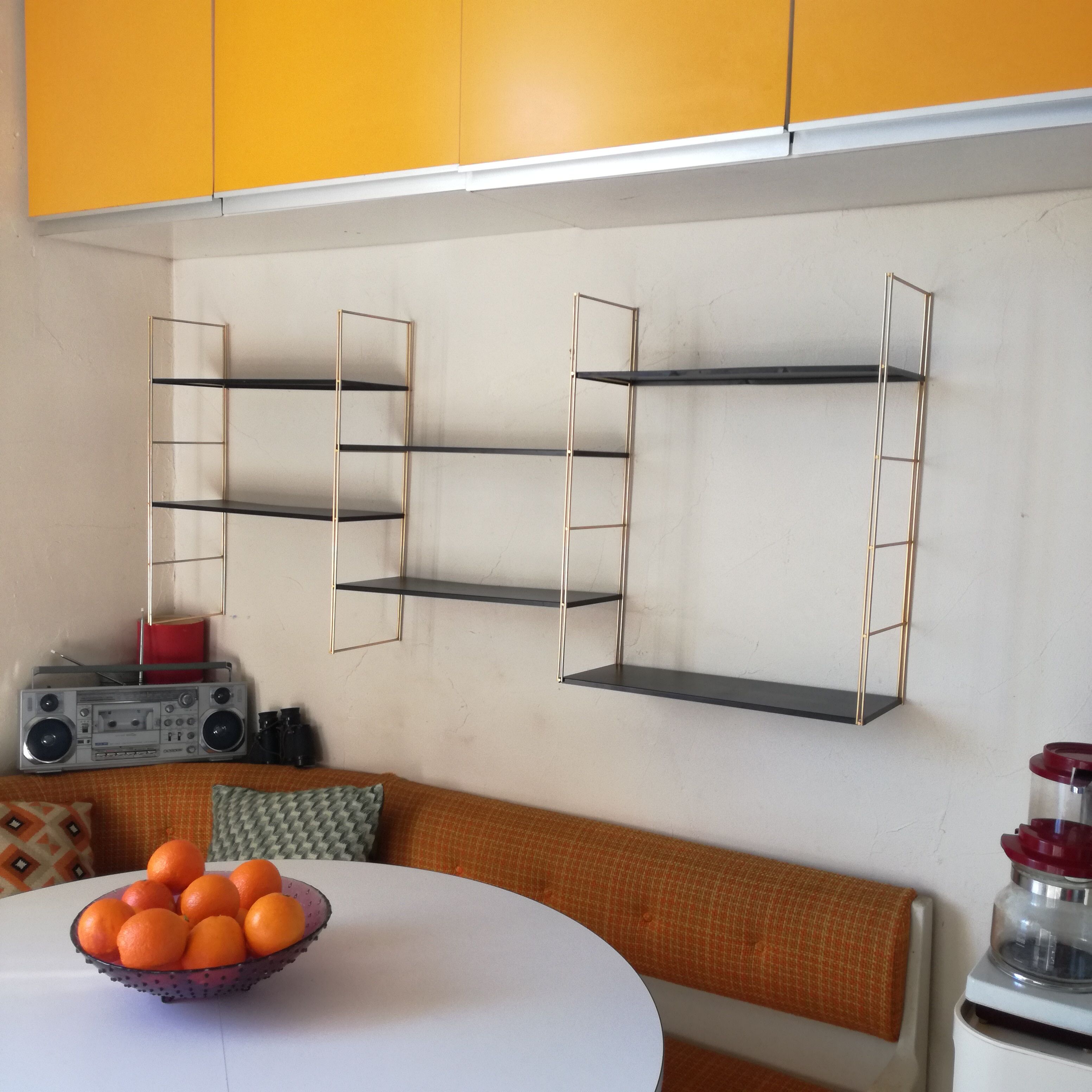 Gold and black thong shelf