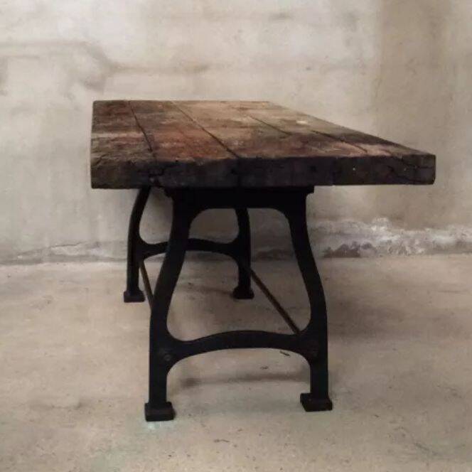 Industrial dining table with cast iron base