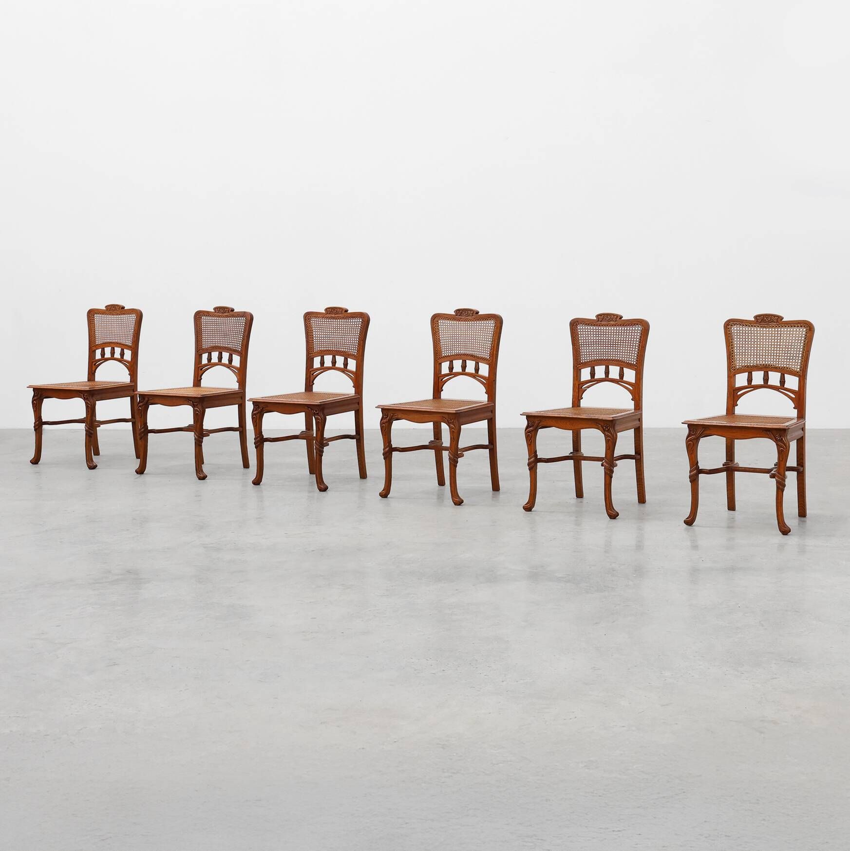 Set of 6 art nouveau dinner chairs in the manner of Victor Horta, Belgium