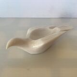 Marble bird empty pocket