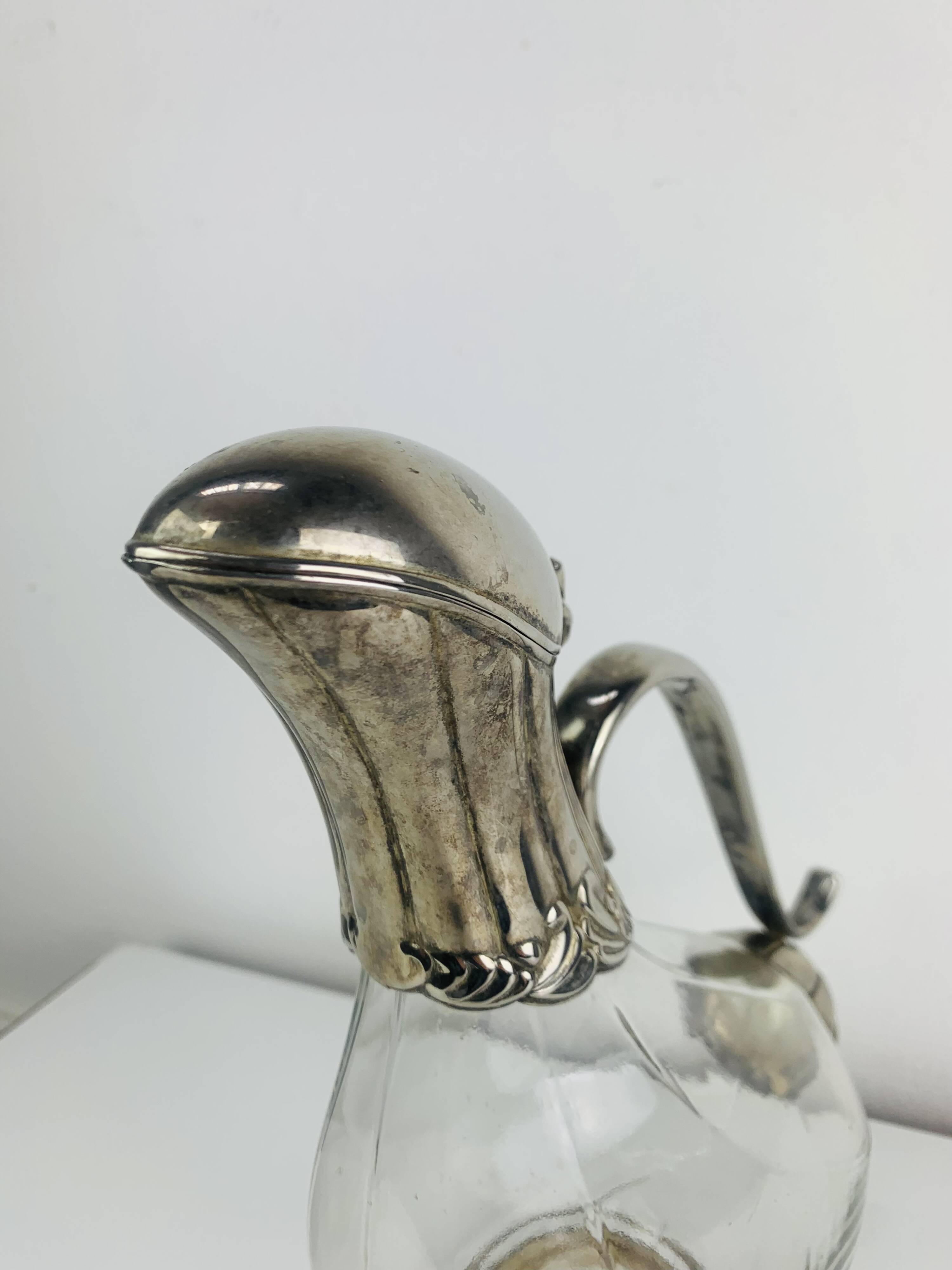 Silver-plated wine carafe jug, duck
