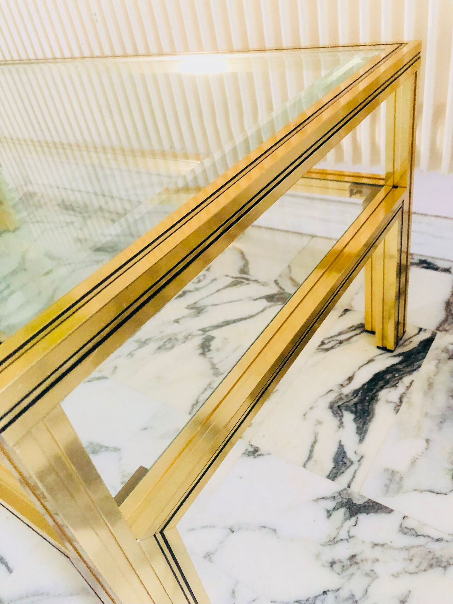 Coffee table with 2 brass and glass tops signed Pierre Vandel Paris, circa 70s.