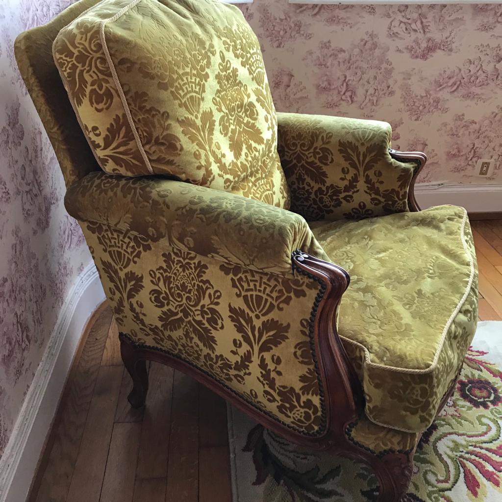 Armchair in golden yellow velvet and louis XV style cherry tree