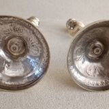 Pair of chiseled brass candlesticks