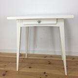 White wood desk foot compass