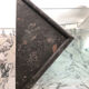 Roche Bobois console in veined black marble and glass, 1990s.