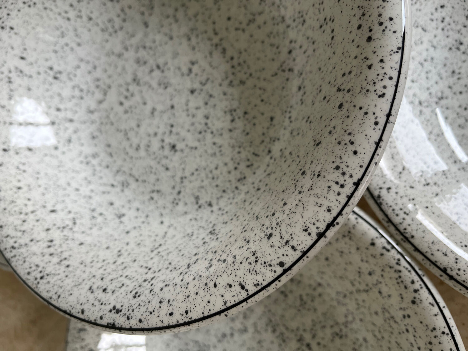 5 hollow plates in hand-speckled Italian ceramic