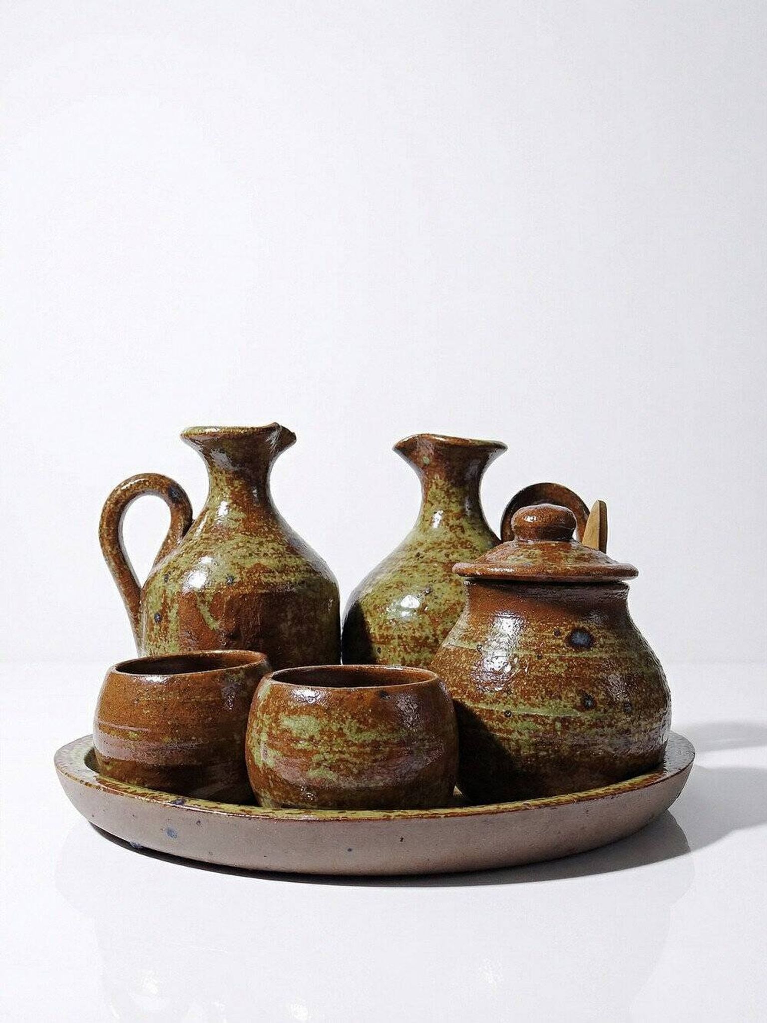 Vintage condiment service in glazed pyrite stoneware, artisanal Baudat La Borne style.