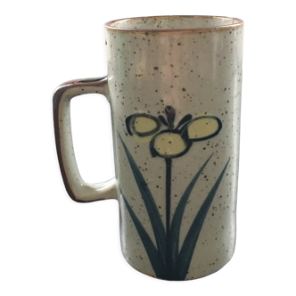 Stoneware mug with floral decoration