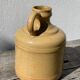 Antique glazed terracotta jug vase
