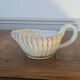 Gravy boat in slipware