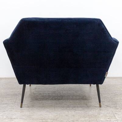 Fauteuil Dutchbone en velours bleu profond