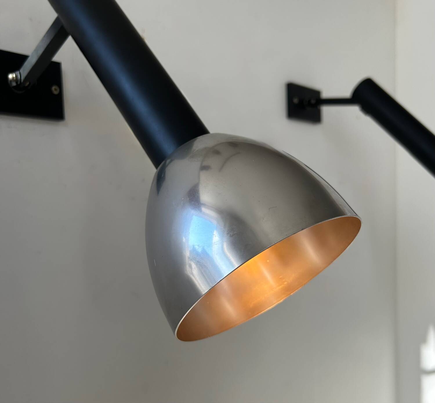 Pair of vintage wall lights, chrome and matte black metal, France 1960