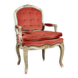 Louis XV style armchair in molded and carved wood with gray and gold patina