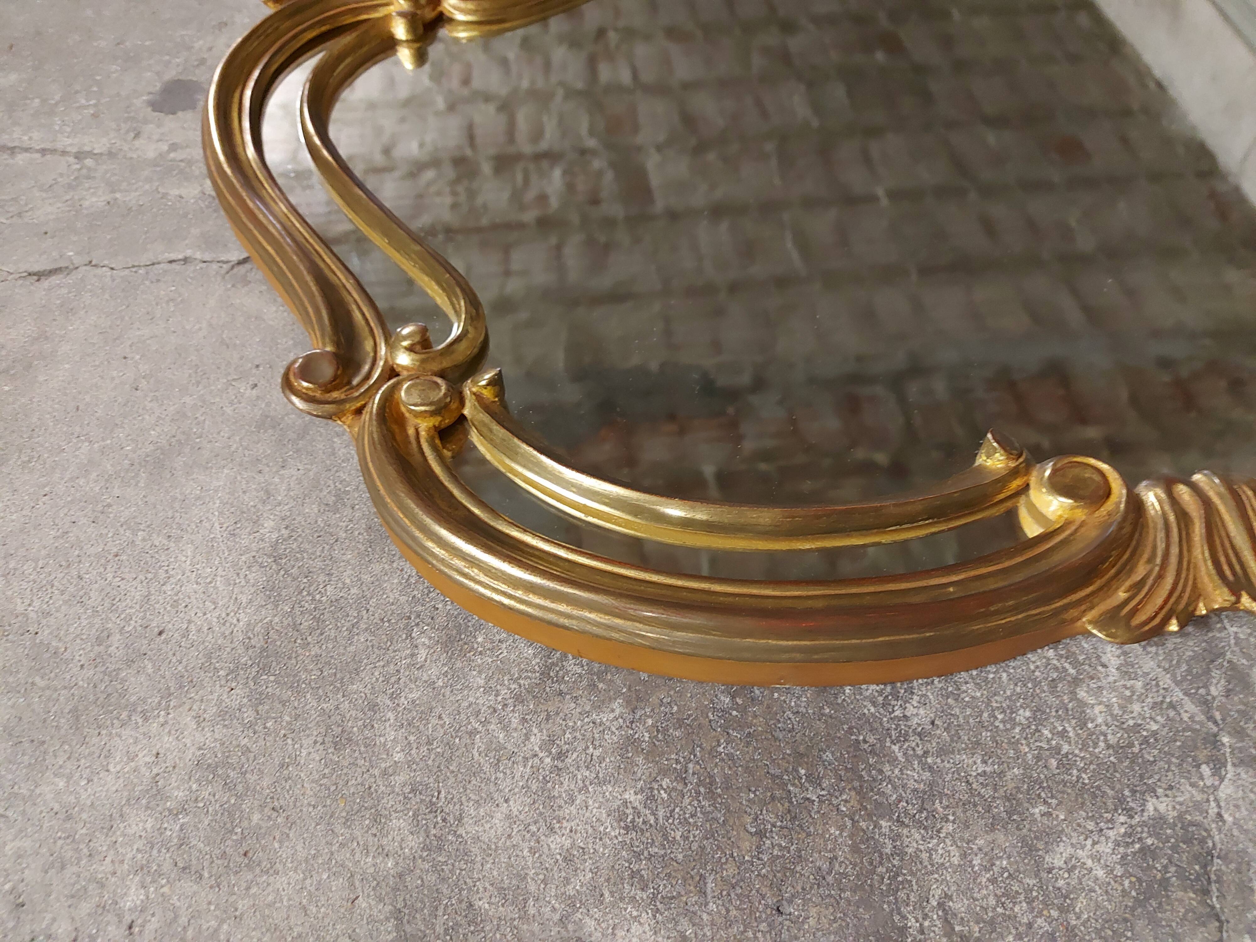 Old gilded wood mirror