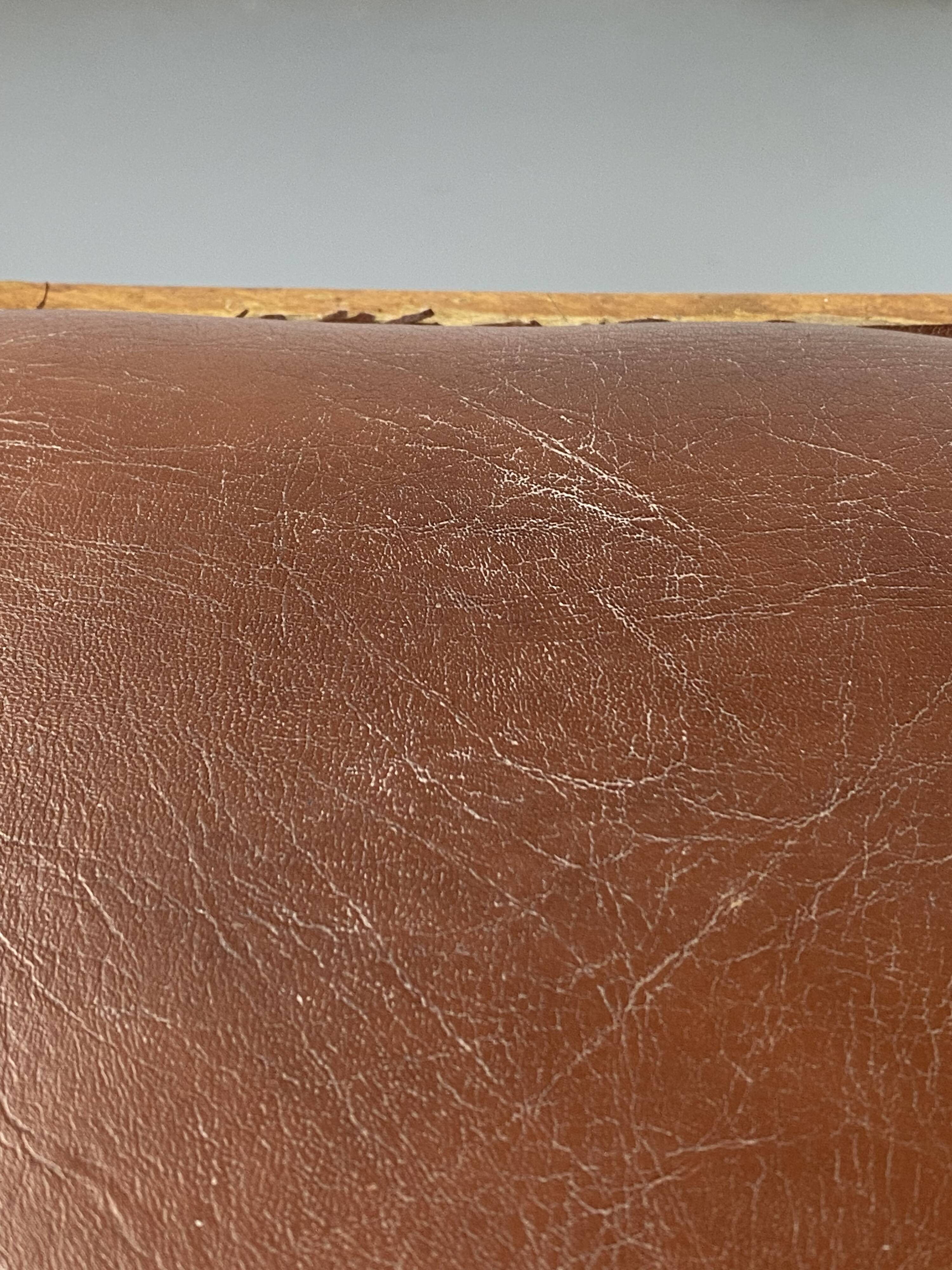 Wooden and leather chairs