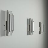 Set of three aluminium cylindrical wall lamps