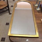 Miroir en bois et stuc doré