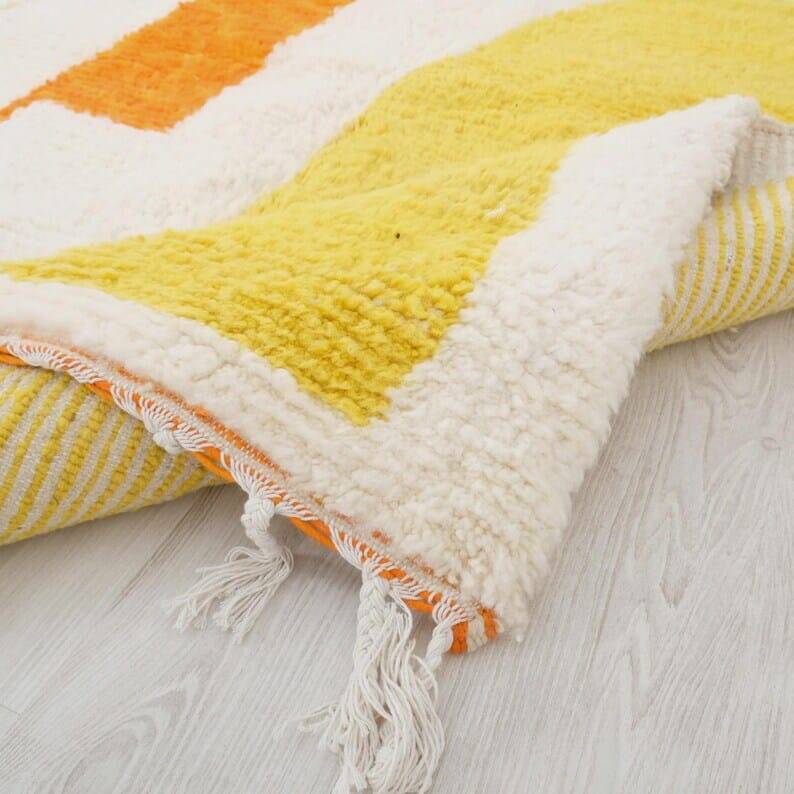 Handwoven Berber rug with traditional coloured patterns, size 1.4/2.6 m.