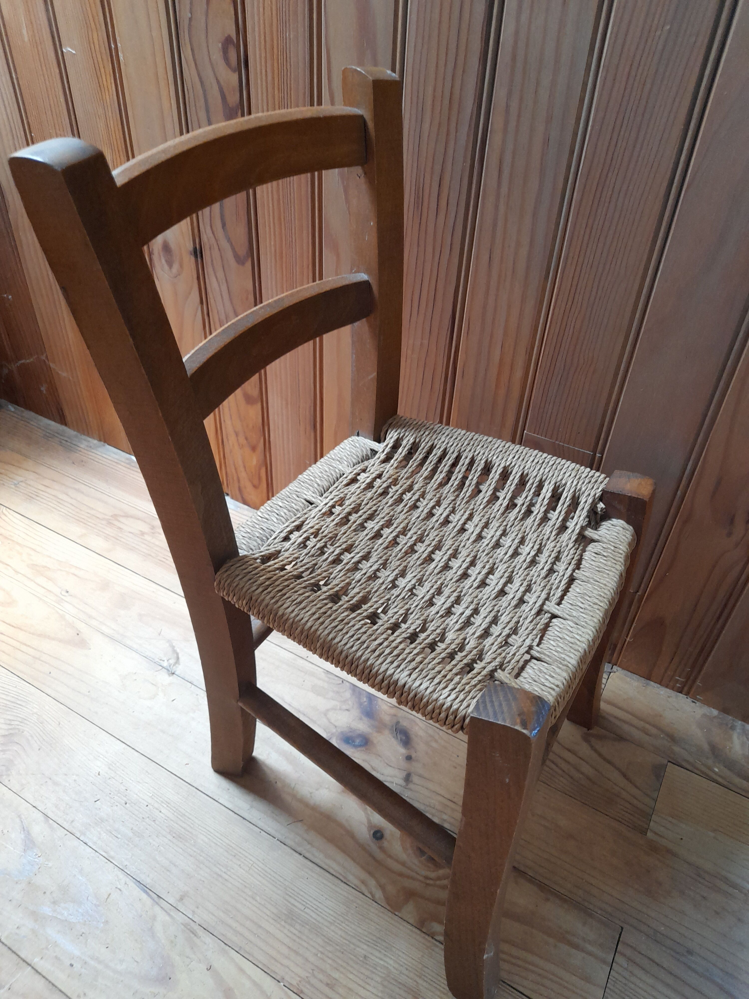 Wooden children's chair, rope seat, circa 1950