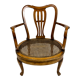 Fauteuil bas anglais en bois ajouré à assise cannée, 19e siècle