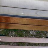 Old garden bench with cast iron feet