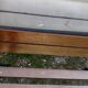 Old garden bench with cast iron feet