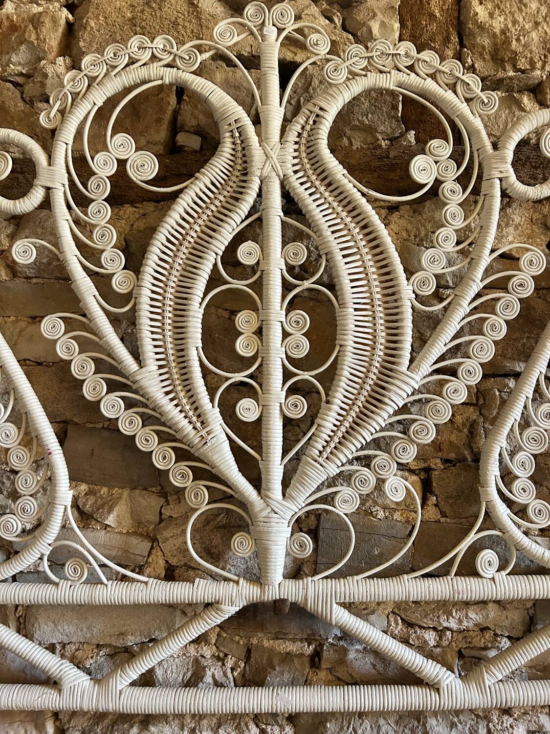 Peacock style white rattan headboard