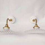 Swan neck sconces in serrated opaline