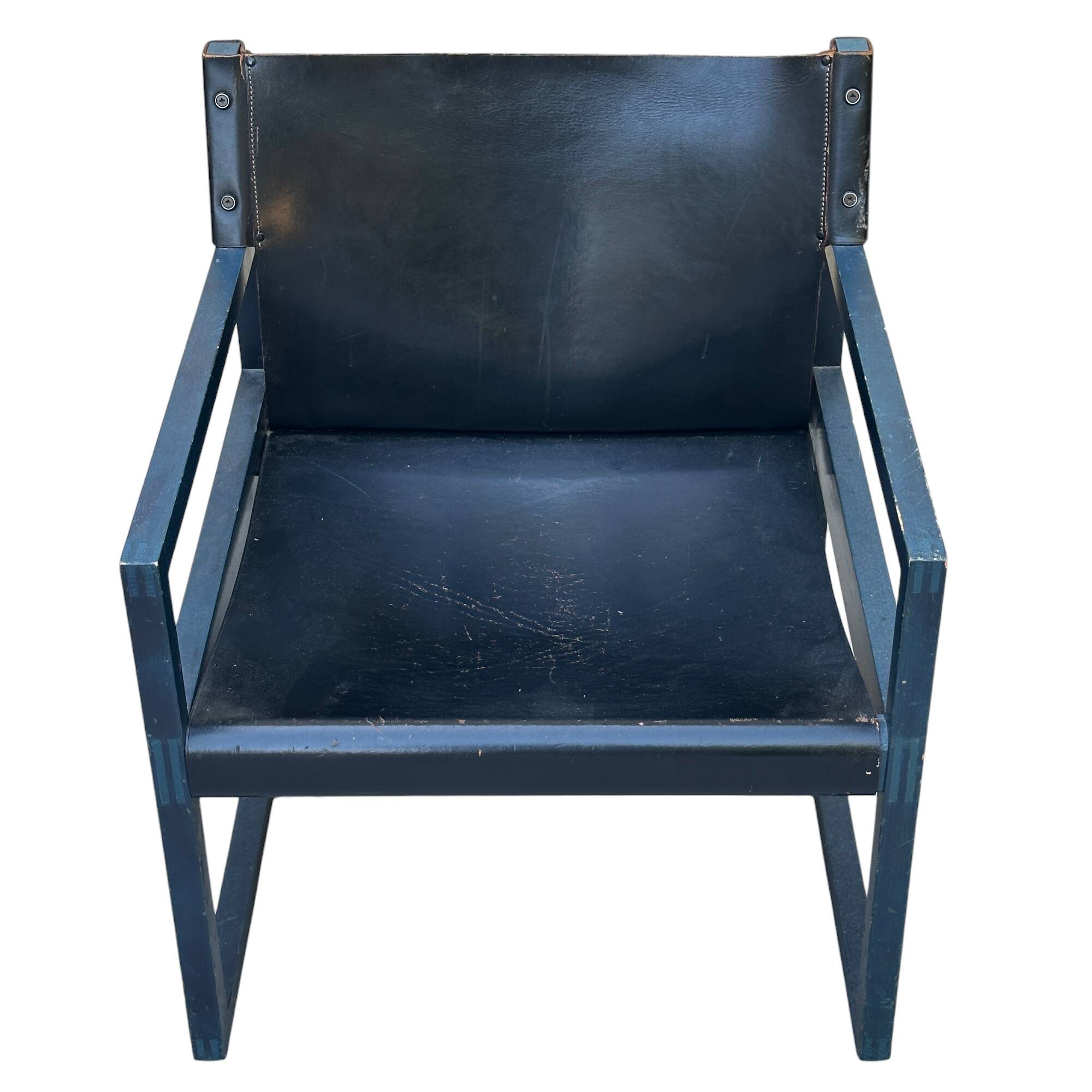 Postmodern lounge chair in black saddle leather and midnight blue wood, 1980.