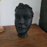 Black ceramic face sculpture