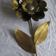 Brass sunflower sconces
