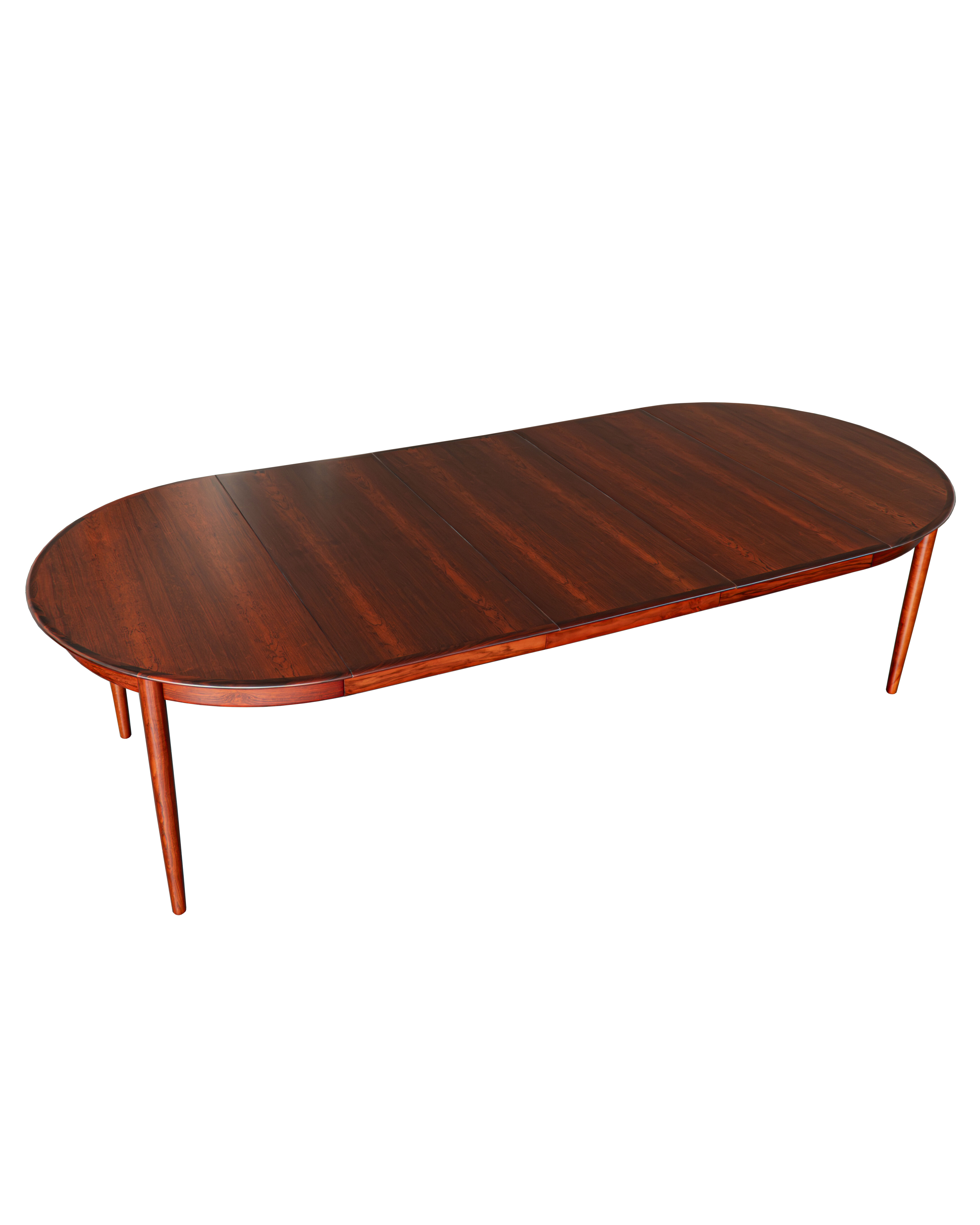 Danish extendable rosewood dinning table by Skovby