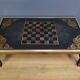 Large chessboard coffee table in mahogany, Jansen style – 2nd half of the 20th century.
